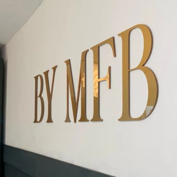 gold salon wall logo by Signature Synes custom signage for UK beauty business studio