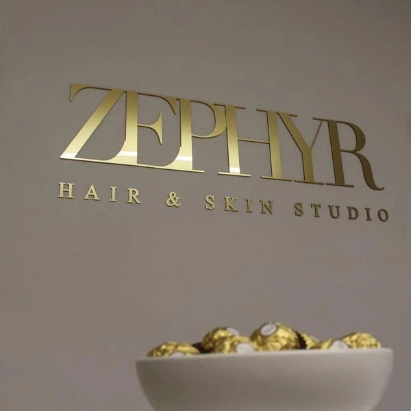 soft gold acrylic wall sign for elegant clinic interior Birmingham