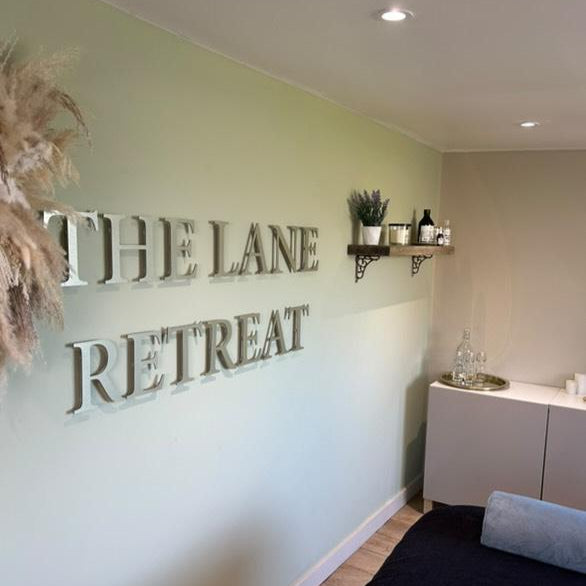 premium brushed gold wall sign for aesthetic clinic design UK Manchester